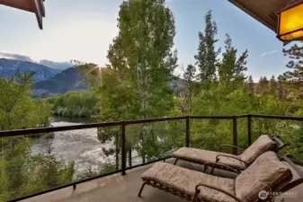 Private deck off Primary Suite looking up the Wenatchee River