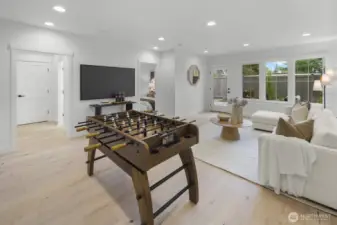 Designed for versatility, the lower level easily accommodates recreation, media, or guest living, with open space that adapts to a range of needs.