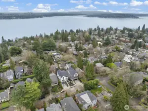 An aerial perspective captures the home’s exceptional Denny Blaine setting, surrounded by mature trees, established streetscapes, and nearby lake views.