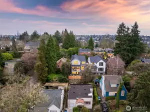 From above, the rear elevation showcases the home’s commanding presence, thoughtful outdoor living areas, and its seamless fit within this coveted neighborhood setting.