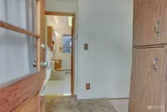 Entry w/ Linen Cabinets.. leads right into the 2nd Bath w/Laundry Hookups.