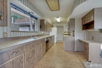 Kitchen w/Built In Desk which is super handy for working while on vacation or WFH!