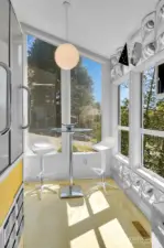 Kitchen eating area with South & East Facing windows for full natural light.