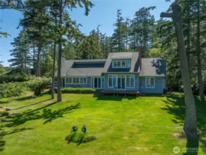 Another view of this well designed home tastefully sited on 1.6 acres with 209 ft of waterfront.