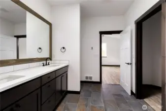 Photo of a similar home in the neighborhood by the same builder