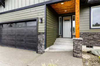 Photo of a similar home in the neighborhood by the same builder