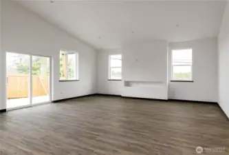 Photo of a similar home in the neighborhood by the same builder