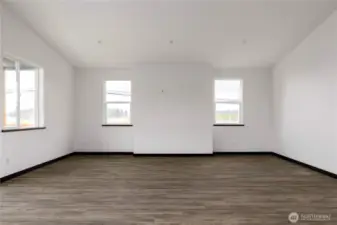Photo of a similar home in the neighborhood by the same builder