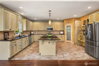 Eating bar is large and offers seating for 4. There is a large pantry for all your Costco runs.
