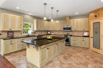 Kitchen is open to the great room, ideal for entertaining.