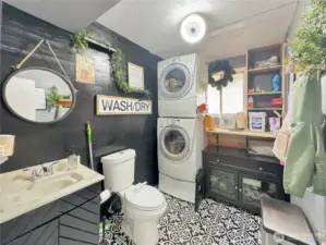 Downstairs Half bath/Laundry. W&D included