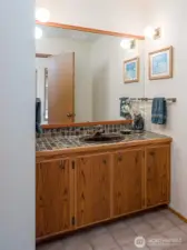 Main floor half bath is near front door.