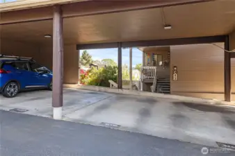 Covered parking - C2. Steps to front door.