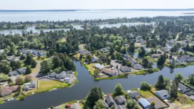 AIRIAL OF THE HOME WITH VIEW OF THE BAY IN THE BACKGROUND!