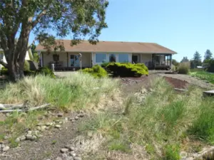 YOUR NEW HOME IS HIDING BEHIND THE EMBANKMENT FROM YOUR DOCK!