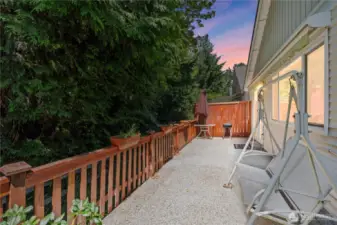 The private, fenced backyard is a true retreat, backing to a lush greenbelt for added serenity and no back neighbors.