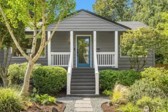 Bright + inviting entry to covered porch.