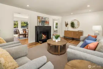 Living room flowing seamlessly into dining area.