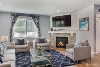 Open floor plan is great for entertaining and leads seamlessly to the covered porch for year round enjoyment