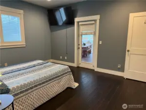 Primary offers access to covered deck and Hot tub