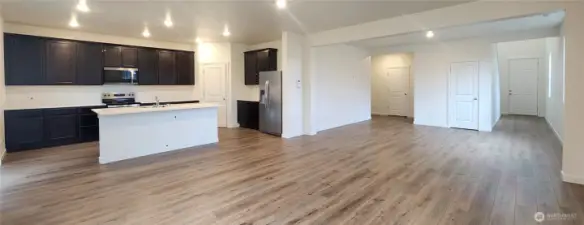 Spacious open concept living and optional main floor bedroom and full bath privately tucked away.