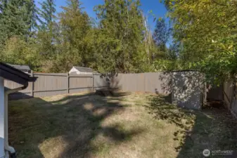 Private backyard of the cottage home.