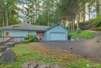 A stunning Benson Lake home, sited perfectly on a double lot with unending views of the lake.