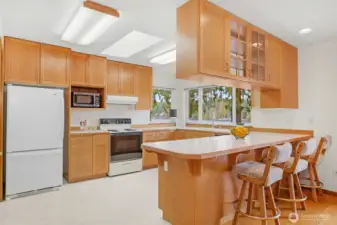 The kitchen is light and bright and has BIG lake views from the beautiful windows.