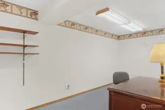A second large office/shop space located off the family room in the lower level.