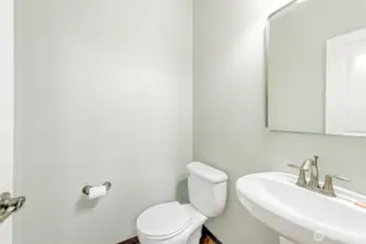 Convenient downstairs half bathroom.