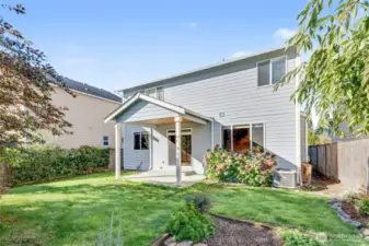 Peaceful backyard is fully fenced. Come make it your own or enjoy as is!