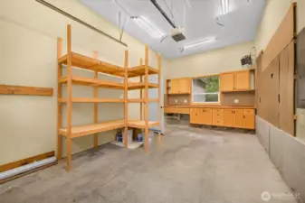 3rd car garage with sink and workshop area