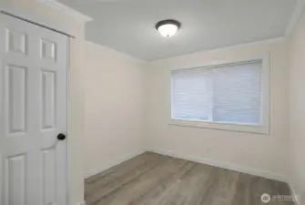 BONUS ROOM attached to carport with heat and  water hook-up. Would make a great home office, workout room, storage, etc.