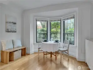 The two bay windows provide amazing natural light and also offer flexibility for furniture placement.