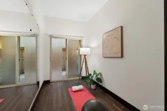 Alternate view of the flexible lower-level room highlighting natural light and generous proportions.