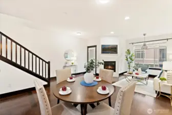 Dining area positioned between living room and kitchen for effortless entertaining.