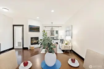 Wide view of the main level highlighting open flow and modern finishes.