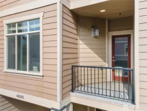 Covered exterior balcony with contemporary detailing.