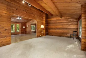 ...arched cased openings, wood beams...