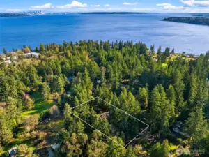 View from above looking northeast with Puget Sound and Seattle in the distance (property boundaries are approximate).