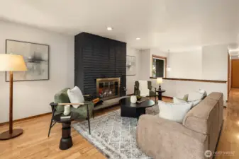 Wood burning fireplace upstairs.