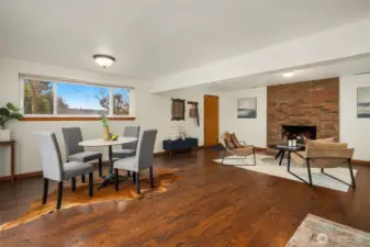 Downstairs open living area with private no-step access door in distant view.