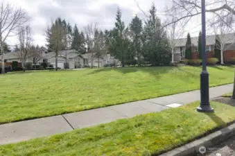 Large green space is located directly across the street.  This area is maintained by the HOA.
