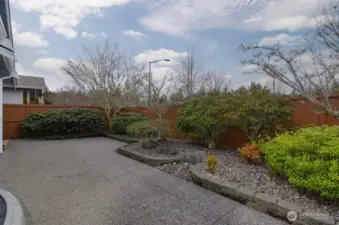 Easy care fully fenced back yard has extended paved area, perfect for outdoor entertaining.