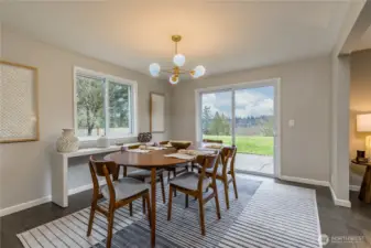 Formal dining room with slider to the back patio