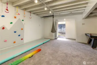 Daylight basement opens up to the side yard