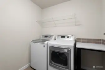 Laundry is upstairs where it is made with room for additional storage and counters