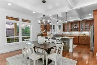 Beautifully refinished hardwood floors complement these living areas as well