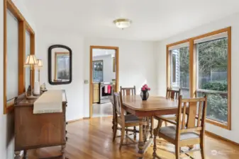 Dining Room has charming etched glass wall between it an the entry