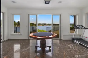 Sunroom, walks out to back yard and lake.